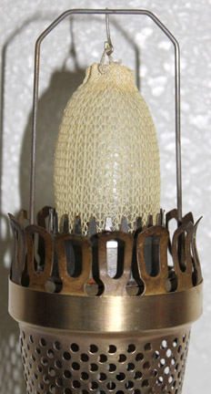 Farmor mantle mounted on lamp